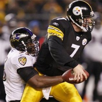 Terrell Suggs tries to take down Big Ben (like a lion taking down a wildebeest at the watering hole) during last year's AL in last year's AFC Championship game. 