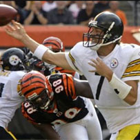 Ben throws under pressure during the first half.