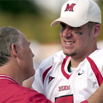 Coach Hep talks to Ben during a game against the UCF Golden Knights at the Citrus Bowl on November 28, 2003 in Orlando, Florida. Miami won 56-21 .