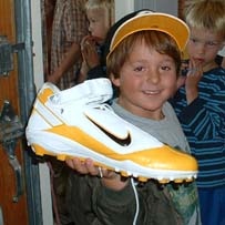 Teddy Huttenhower shows off his Ben Roethlisberger shoe to his 1st  and 2nd grade classmates on Monday.  Photo courtesy of Rich  Huttenhower.  Please do not use or copy without Mr. Huttenhower's  permission.
